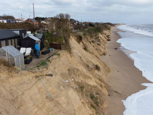 Former soldier Lance Martin’s garden in Hemsby, Norfolk, is disappearing due to coastal erosion (Joe Giddens/PA)