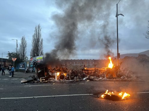 The wreckage of a Translink Metrobus (Liam McBurney/PA)