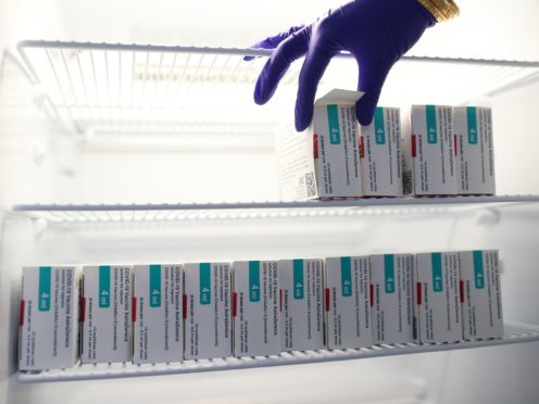 Vials of the Oxford/AstraZeneca vaccine stored in a temperature-controlled fridge (PA)