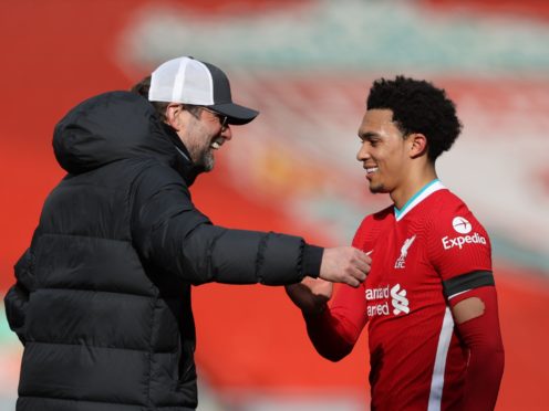 Jurgen Klopp’s (left) side registered their first home Premier League win in four months (Clive Brunskill/PA)