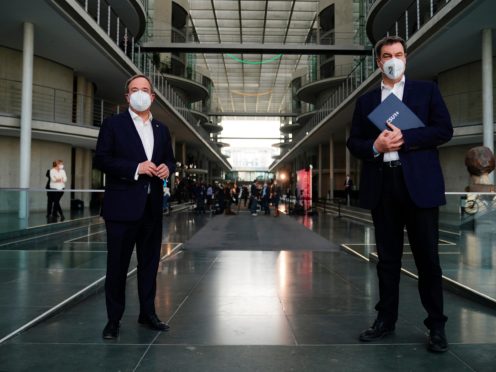 The chairman of the German Christian Democratic Party (CDU), Armin Laschet, left, and the chairman of the German Christian Social Union (CSU), Markus Soeder, right (Michael Kappeler/AP)