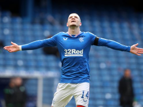 Rangers’ Ryan Kent celebrates his 12th goal of the season in the champions’ 2-1 win over Hibs (Andrew Milligan/PA)