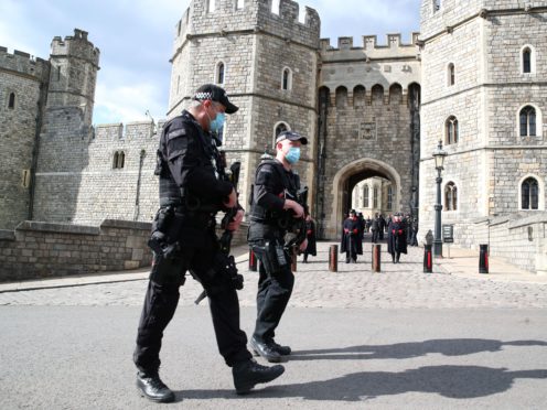 Police outside Windsor Castle, Berkshire (Steve Parsons/PA)