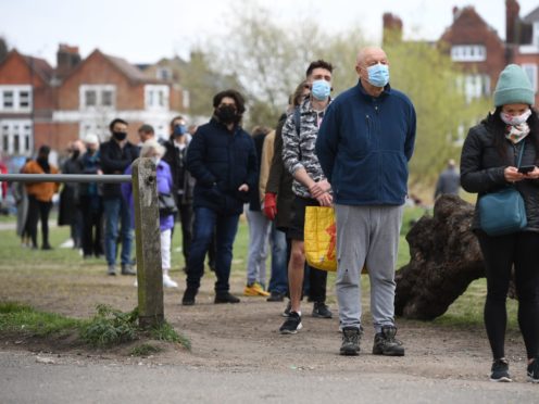A queue for surge testing on Clapham Common (Kirsty O’Connor/PA)