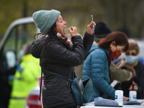 People take part in coronavirus surge testing on Clapham Common, south London (Kirsty O’Connor/PA)