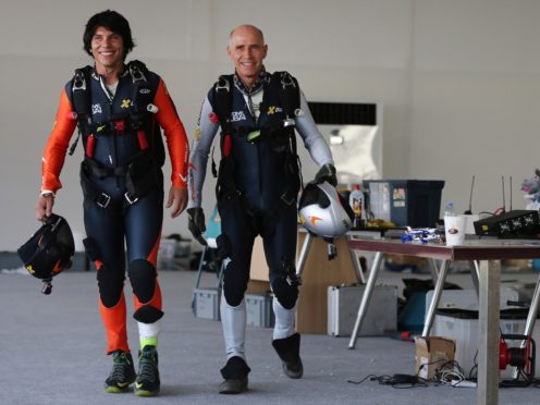 Vincent Reffet, left, was the protege of Swiss pilot Yves Rossy (AP)