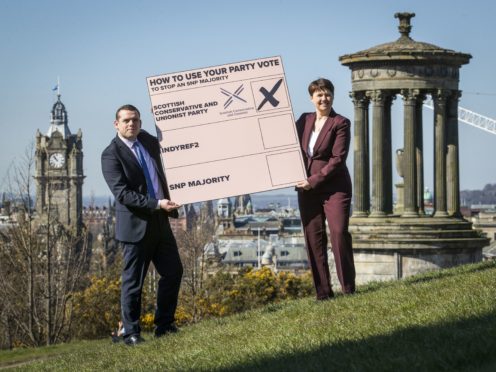 Douglas Ross and Ruth Davidson campaign for Scots to use their list vote to support the Scottish Conservatives (Jane Barlow/PA)