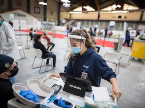 The premier of Canada’s most populous province says he will be limiting outdoor gatherings to those in the same household amid a record wave of coronavirus infections fueled by variants (Tijana Martin/The Canadian Press/AP)
