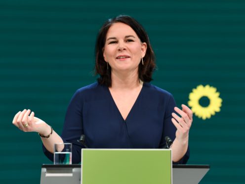 Germany’s Green party co-leader Annalena Baerbock gives a speech during a digital announcement event in Berlin, Germany, where the party presented her as top candidate for chancellor (Annegret Hilse/Pool via AP)