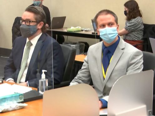 Defence lawyer Eric Nelson, left, and defendant Derek Chauvin at the Hennepin County Courthouse in Minneapolis (Court TV via AP/Pool)