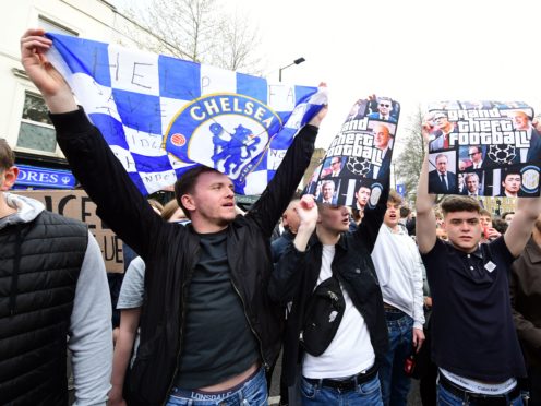 Fans protest against Chelsea’s involvement in the new European Super League (Ian West/PA)