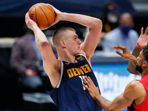 Nikola Jokic needed just three quarters to score his 53rd double-double of the season and help the injury-hit Denver Nuggets to victory over the Toronto Raptors (David Zalubowski/AP)