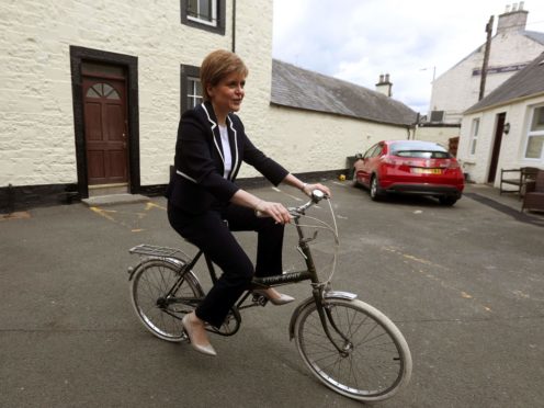 SNP leader Nicola Sturgeon is promising action to get more Scots cycling (Andrew Milligan/PA)