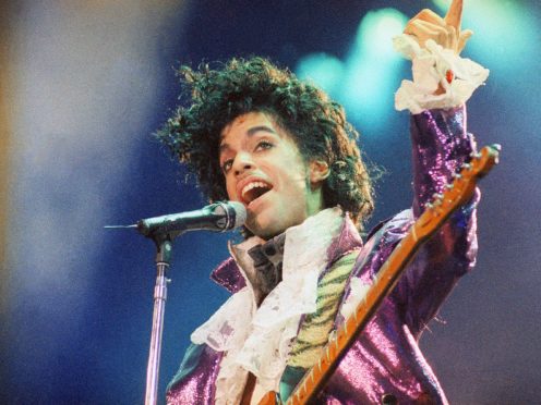 Fans of rock star Prince turned out to his former home in Minneapolis on the fifth anniversary of his death on Wednesday (Liu Heung Shing/AP)