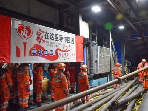 Rescue workers are trying to reach 21 coal miners trapped by an underground flood in north-west China (Gao Han/Xinhua News Agency/AP)