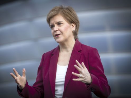 Nicola Sturgeon promised changes to the benefits system if the SNP are re-elected next month (Jane Barlow/PA)