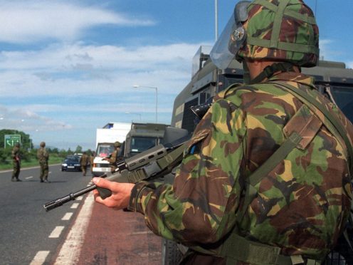 Soldiers man a checkpoint on the Belfast to Dublin road (PA/PA)