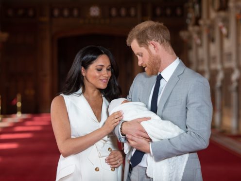 The Duke and Duchess of Sussex with Archie soon after he was born (Dominic Lipinski/PA)
