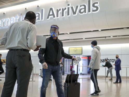 Restrictions on foreign holidays should be maintained to protect the UK from Covid-19 variants, MPs have warned (Steve Parsons/PA)