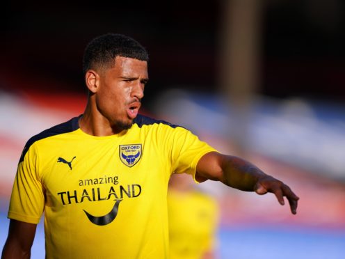 Marcus McGuane has signed a permanent deal with Oxford but will be unable to face Burton due to injury (John Walton/PA)