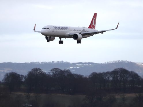 A Turkish Airlines plane arrives at Edinburgh airport (PA)