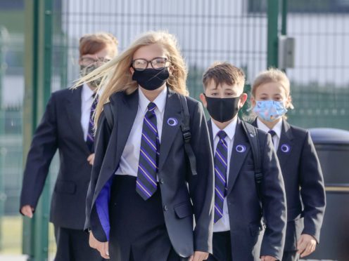 Pupils wear protective face masks as they returned to Outwood Academy Adwick in Doncaster (Danny Lawson/PA)