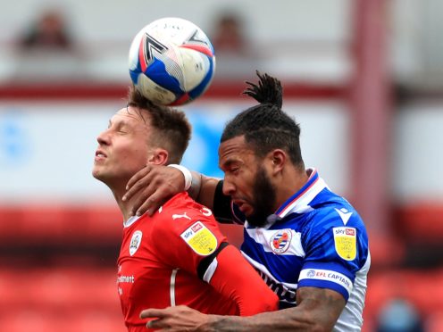 Reading skipper Liam Moore, right, could return in his side’s last game of the season (Mike Egerton/PA)