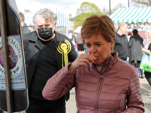 Nicola Sturgeon on the campaign trail (Russell Cheyne/PA)