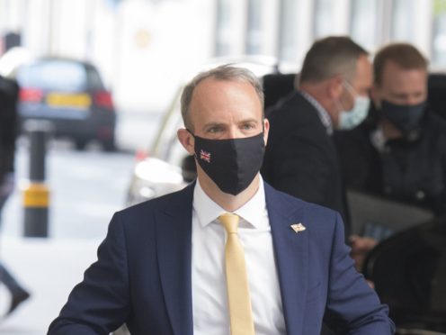 Foreign Secretary Dominic Raab said foreign aid had to be cut due to the coronavirus pandemic (Ian West/PA)