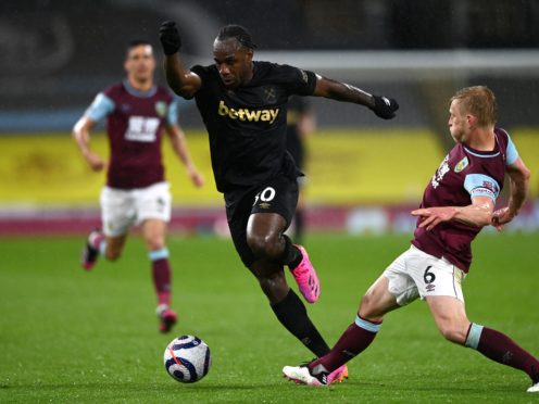 Michail Antonio (centre) inspired West Ham to a vital win at Burnley (Gareth Copley/PA)