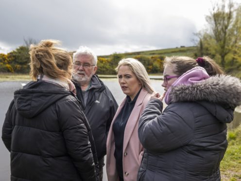 (L to R) Lisa Dorrian’s sister Michelle, father John, sister Joanne, and sister Ciara at The Clay Pits in Ballyhalbert (Liam McBurney/PA)