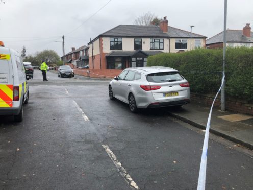 A police cordon in place at Walker Avenue in Bolton where a 15-year-old boy was stabbed several times. Greater Manchester Police said he had suffered several stab wounds and was taken to hospital but died from his injuries. Picture date: Tuesday May 4, 2021.