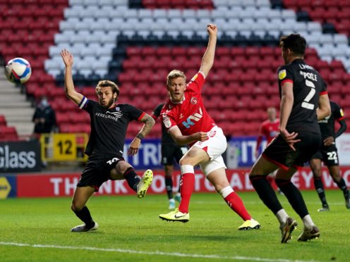 Jayden Stockley, centre, sets Charlton on their way to victory (Adam Davy/PA)