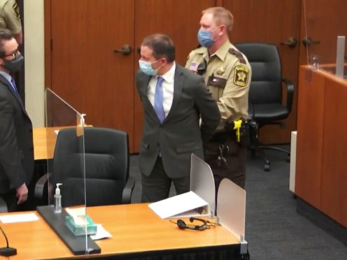In this April 20, 2021 file image from video, former Minneapolis police Officer Derek Chauvin is taken into custody as his attorney, Eric Nelson, left, looks on (Court TV via AP/ Pool)