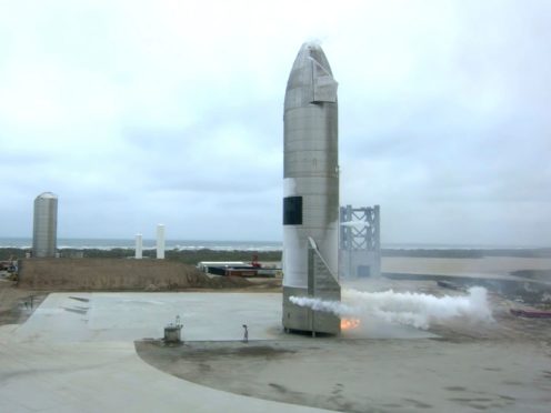 The Starship test vehicle sits on the ground after returning from a flight test in Boca Chica, Texas (SpaceX/AP)