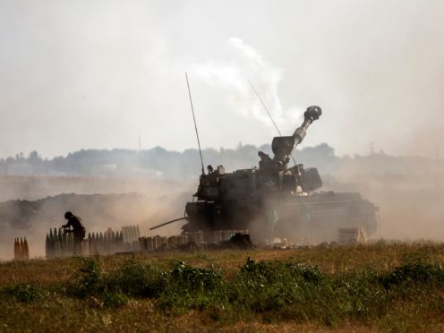 An Israeli artillery unit fires toward targets in the Gaza Strip (AP)