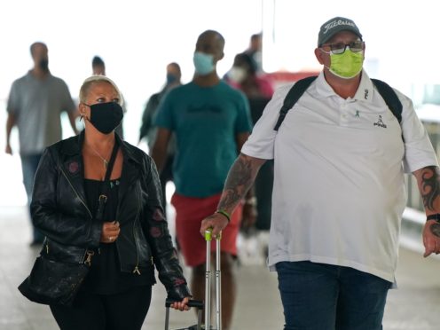 Charlotte Charles (left) and Tim Dunn, the parents of Harry Dunn arrive at Terminal 2 of Heathrow Airport, London, before departing on a flight to the US to give evidence under oath as part of a damages claim against their son???s alleged killer. Picture date: Tuesday June 29, 2021.