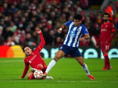 Liverpool’s Takumi Minamino (left) and Porto’s Luis Diaz battle for the ball during the UEFA Champions League, Group B match at Anfield, Liverpool. Picture date: Wednesday November 24, 2021.