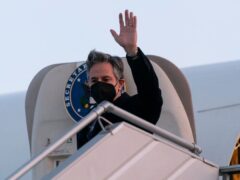 Secretary of State Antony Blinken waves as he arrives at Boryspil International Airport (AP)