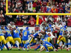 Los Angeles Rams’ Matt Gay (8) kicks a 30-yard field goal to defeat the Tampa Bay Buccaneers 30-27 in the NFL divisional round (John Raoux/AP)