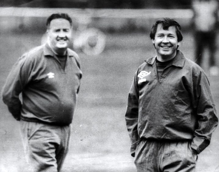 The late great Jock Stein on Scotland duty alongside Sir Alex Ferguson.