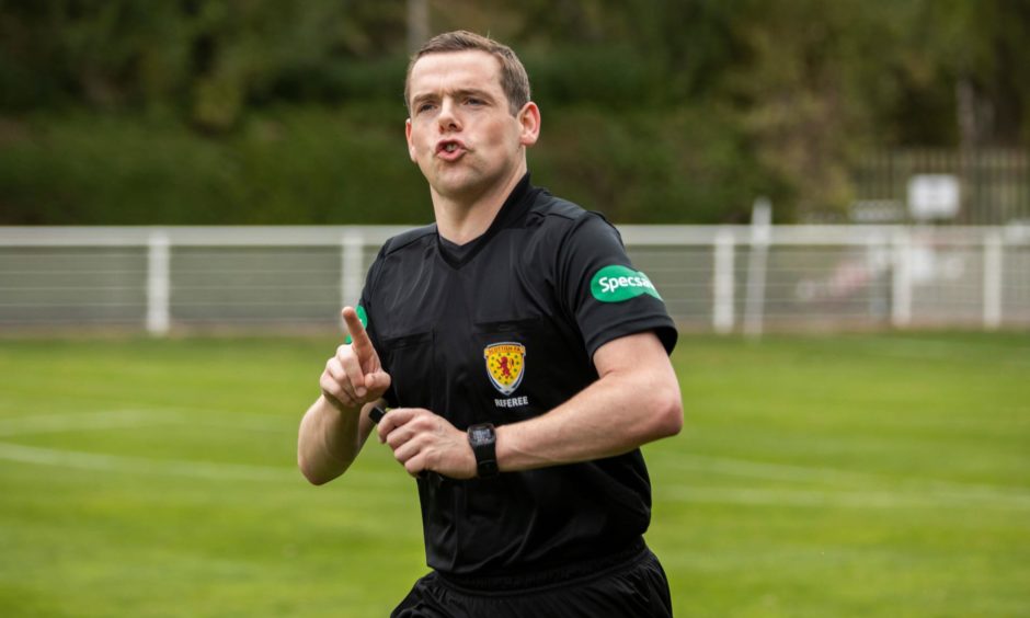 Doublas Ross MP in his capacity as a referee