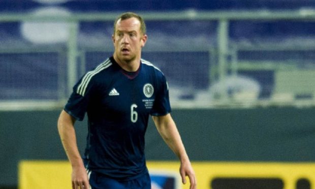 Charlie Adam in action for Scotland.