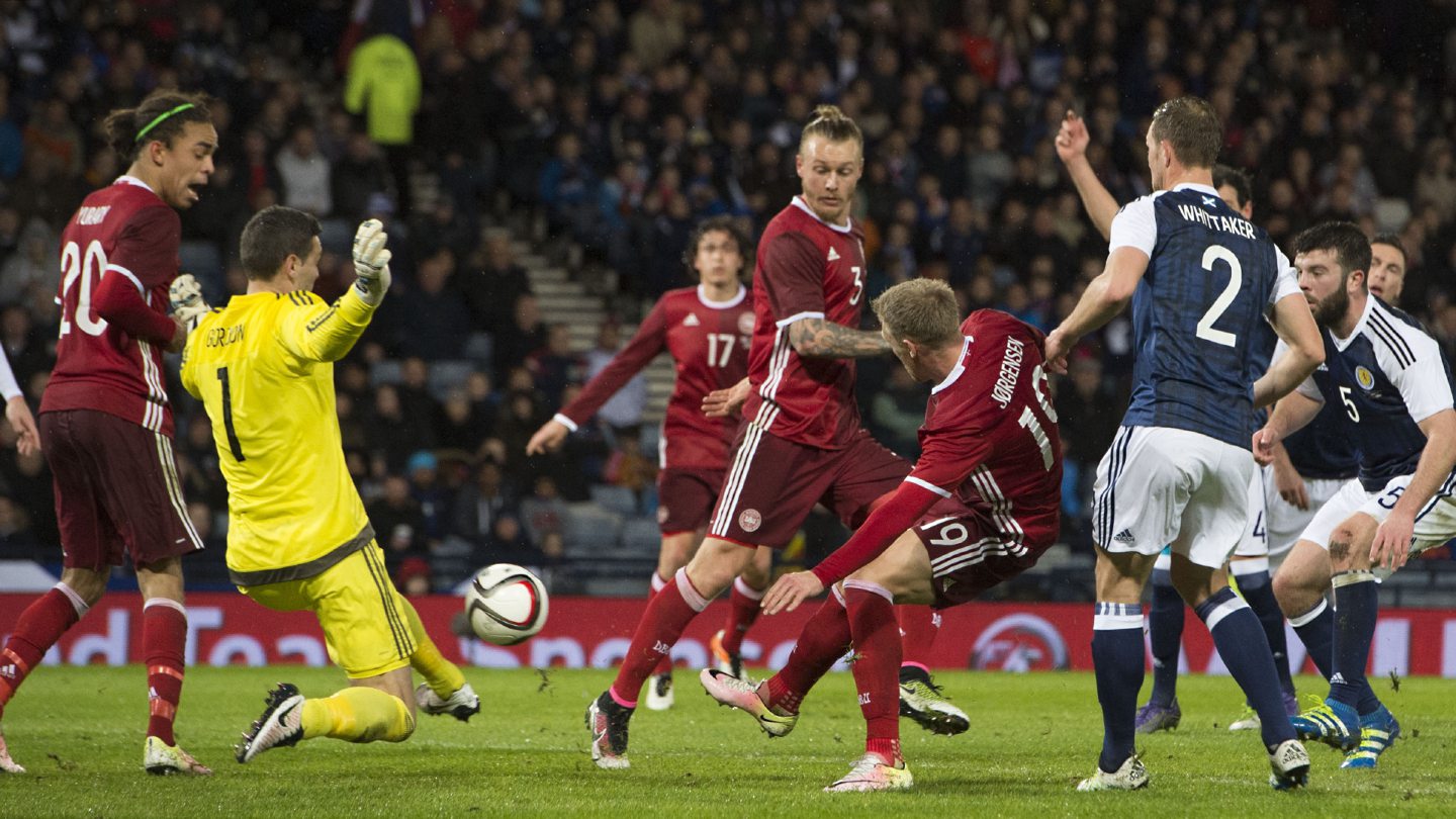 Scotland's Craig Gordon makes the save from Denmark's Nicolai Jorgensen in 2016.