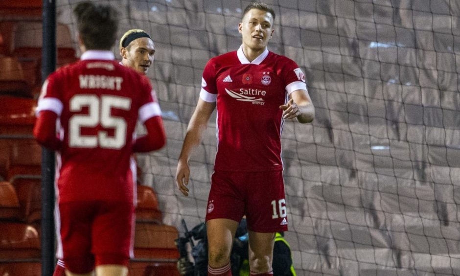 Aberdeen's Sam Cosgrove celebrates after scoring to make it 2-0 during the Scottish Premiership match between Aberdeen and Hibernian at Pittodrie Stadium on November 6.