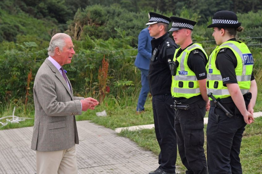 The Duke of Rothesay at the Stonehaven derailment meeting police officers