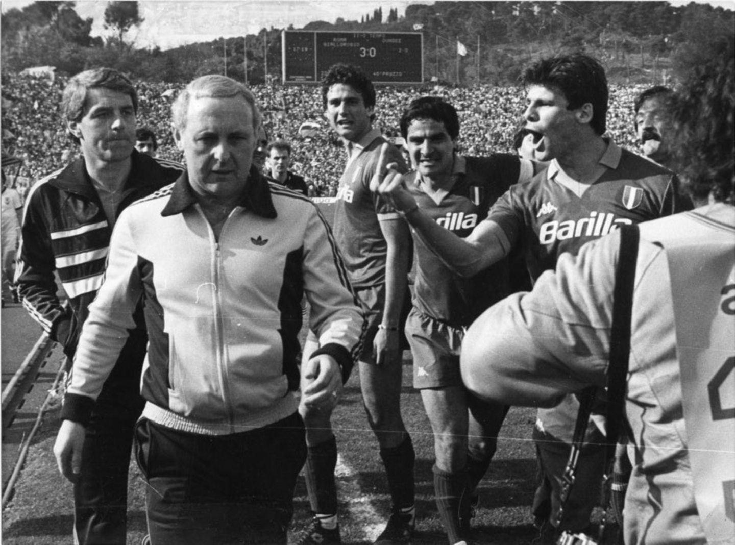Roma players abuse Jim McLean at full-time after Dundee United are knocked out.