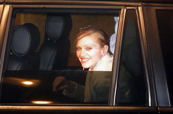 Madonna arriving at Dornoch’s Church of Scotland cathedral for the christening of her son Rocco