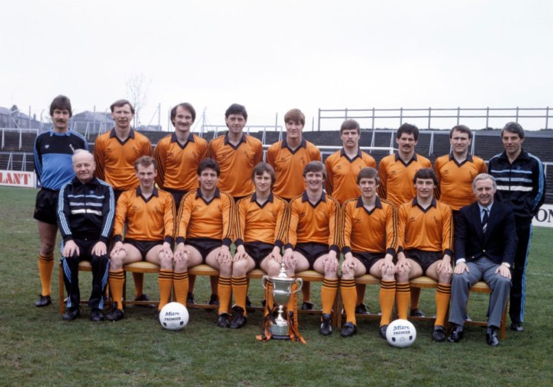 The Dundee United team in a team photo with the league trophy. Some of the players were considered as contenders to be the new Dundee United manager