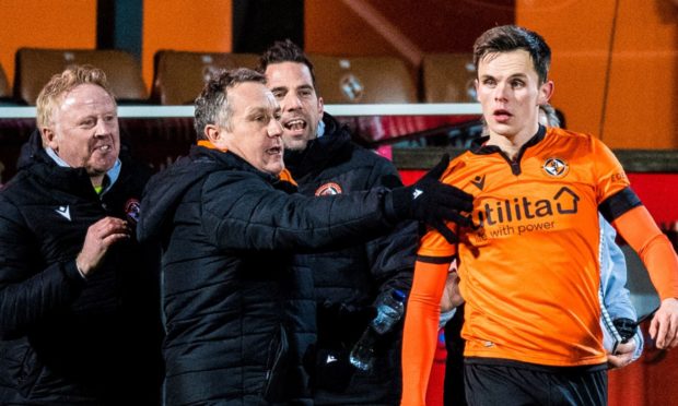 Lawrence Shankland celebrates with Dundee United boss Micky Mellon.